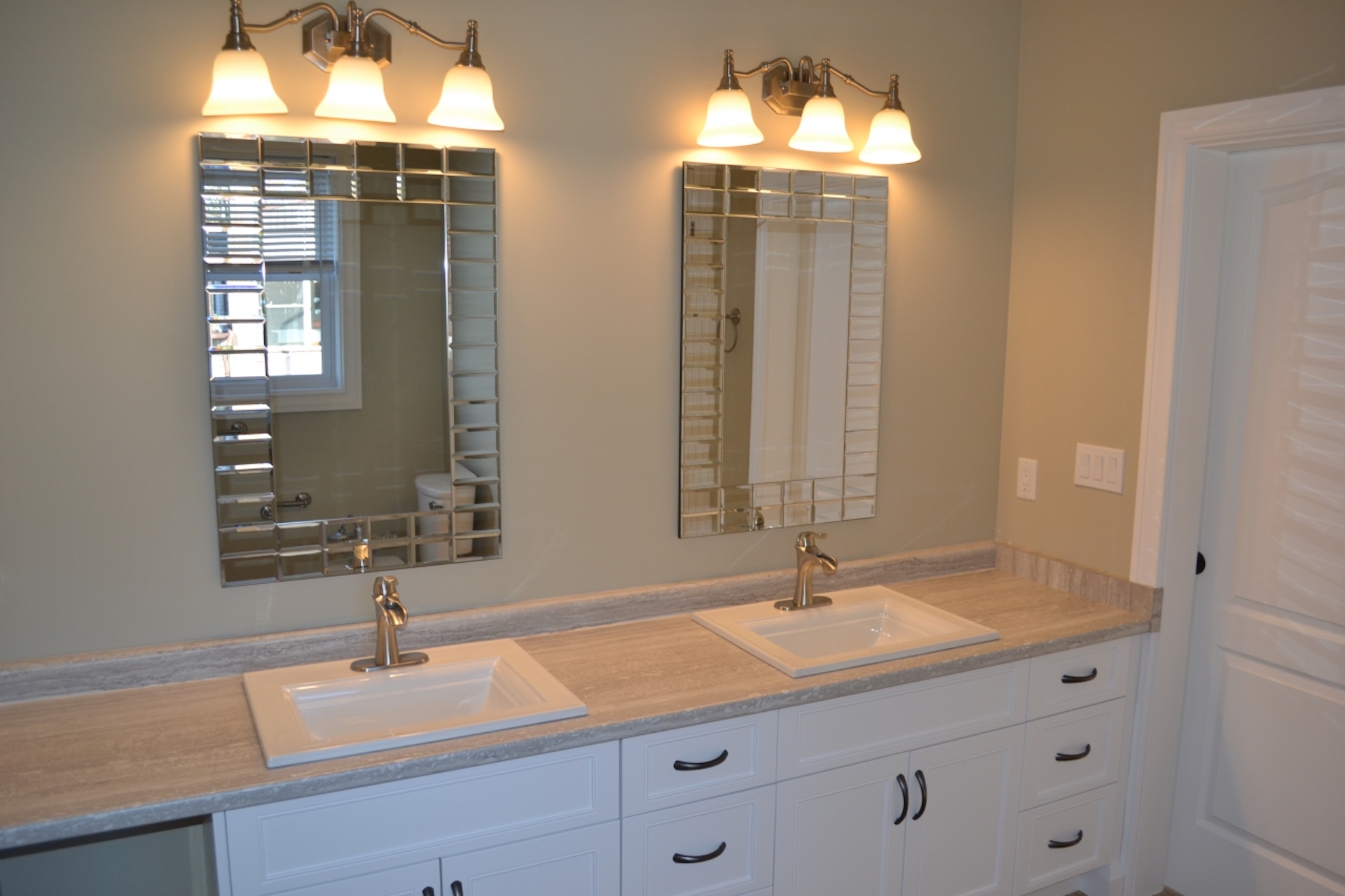 Double vanity and mirrors bathroom in Simcoe
