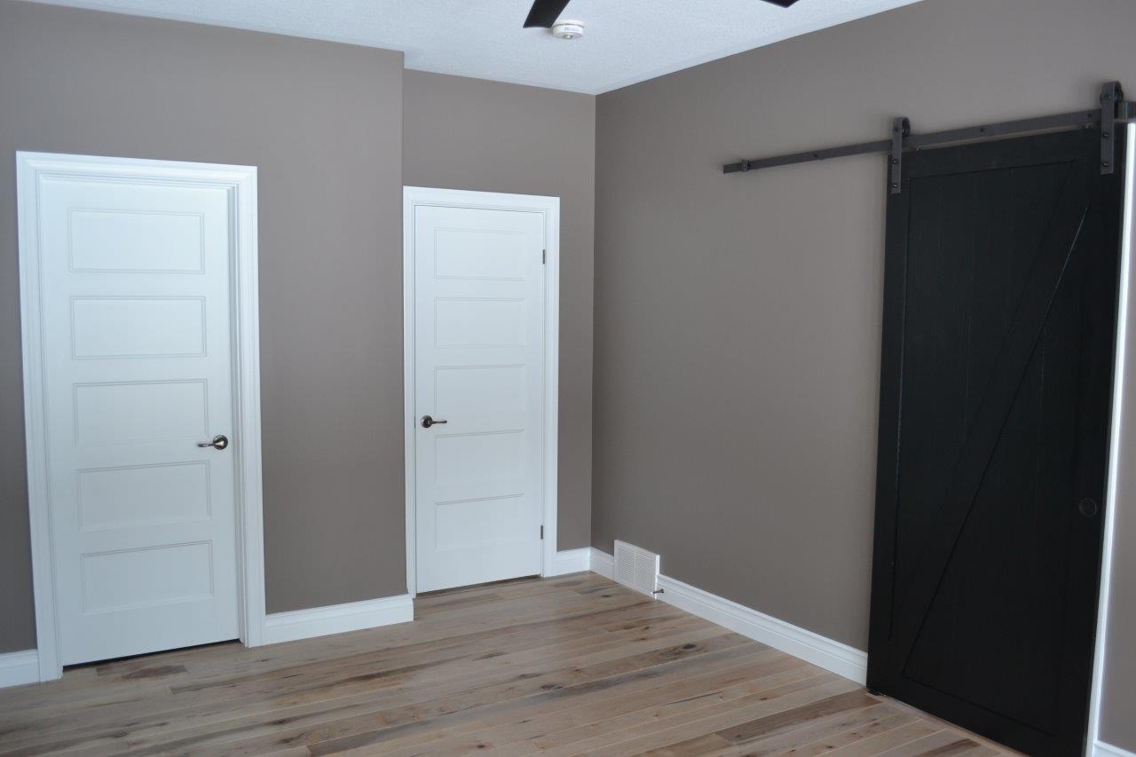 Clean bedroom with sliding door